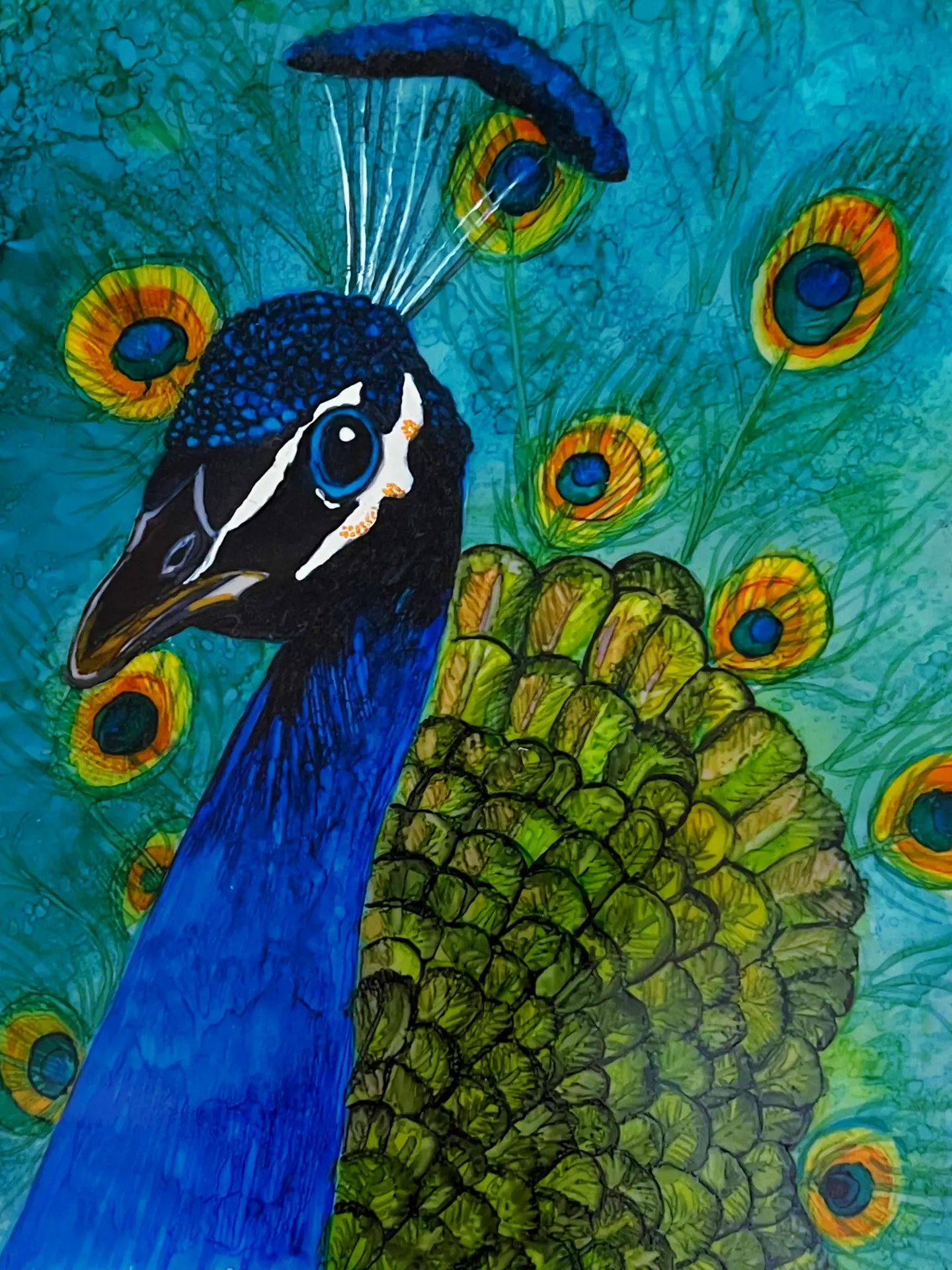 Alcohol ink peacock portrait in cobalt, teal, and green